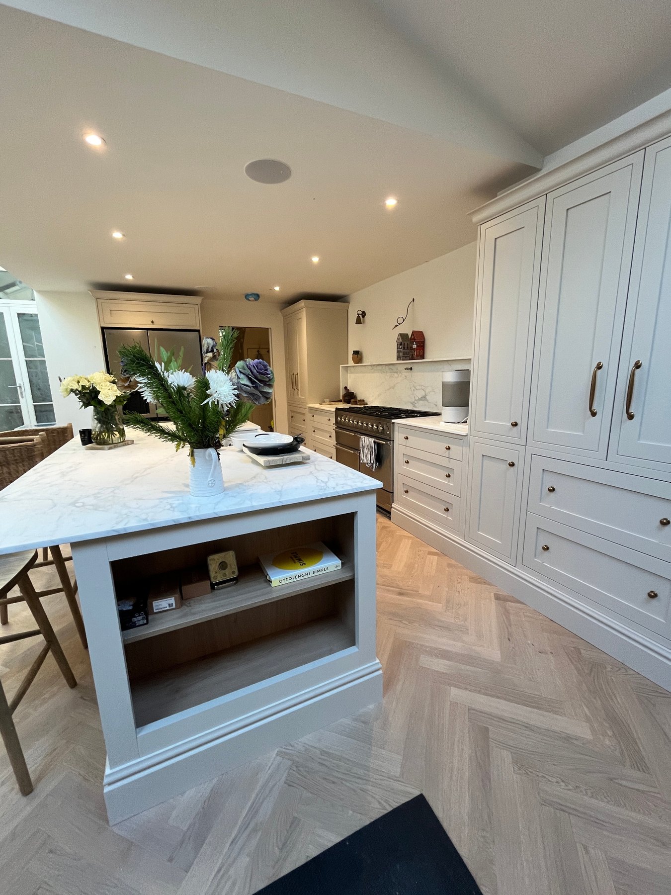 Completed London kitchen with island, cabinetry and worktops